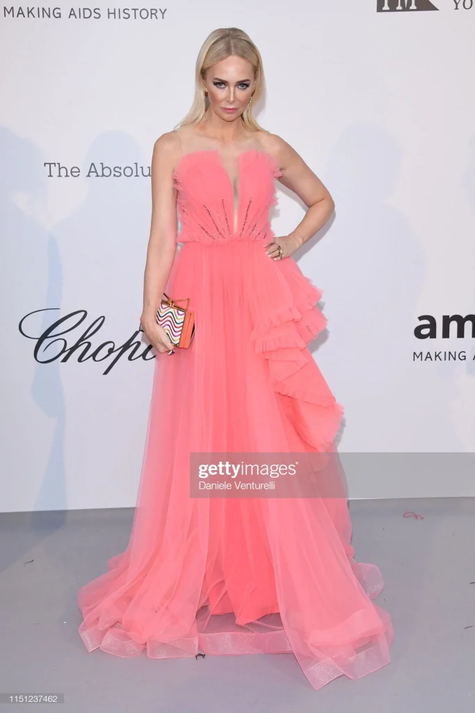 Amanda Cronin shining in our coral dress at the AMFAR party during the Cannes Film Festival. — image 3